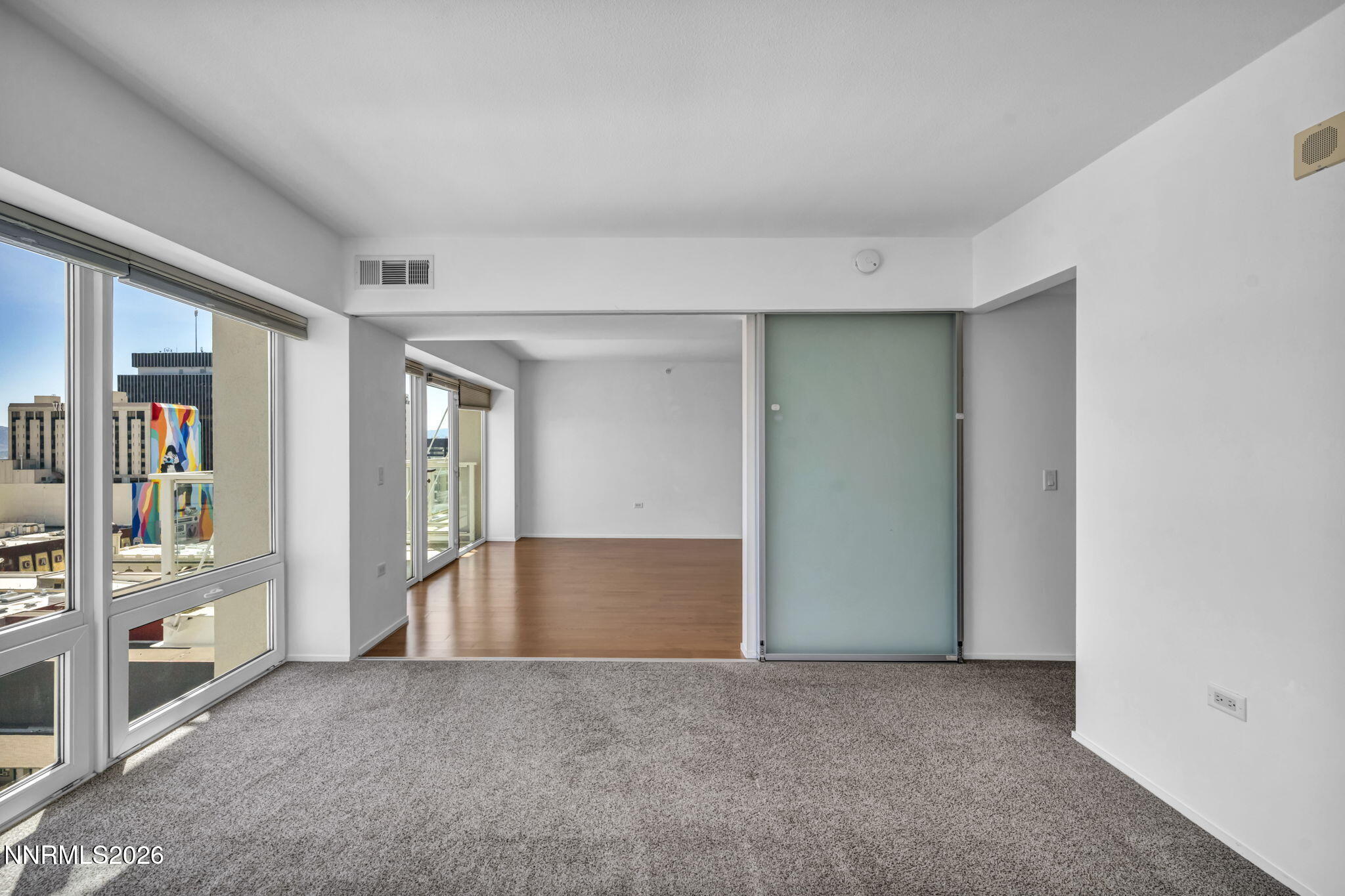 255 North Sierra Street, Unit 1208 Reno, NV 89501 - Photo 16 of 37 a view of an empty room with large window