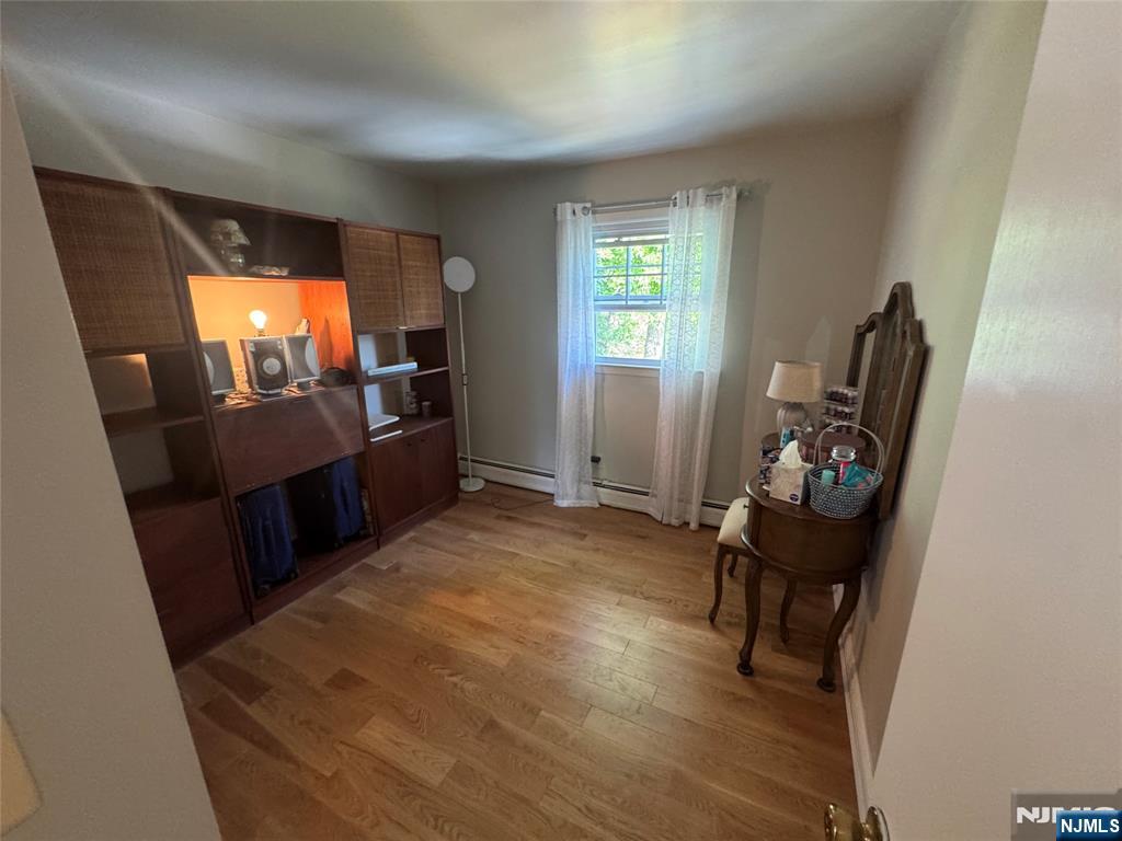 55 Maryann Road Oak Ridge, NJ 07438 - Photo 11 of 20 a view of a livingroom with furniture and windows