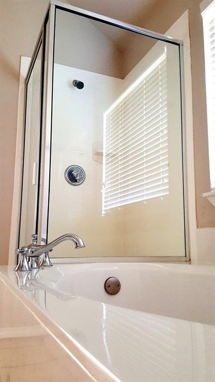 4808 Heber Springs Trail Fort Worth, TX 76244 - Photo 11 of 16 a bathroom with a granite countertop sink and a mirror
