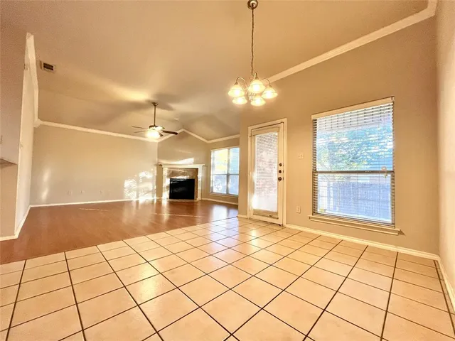 a view of a livingroom with a furniture wooden floor and window