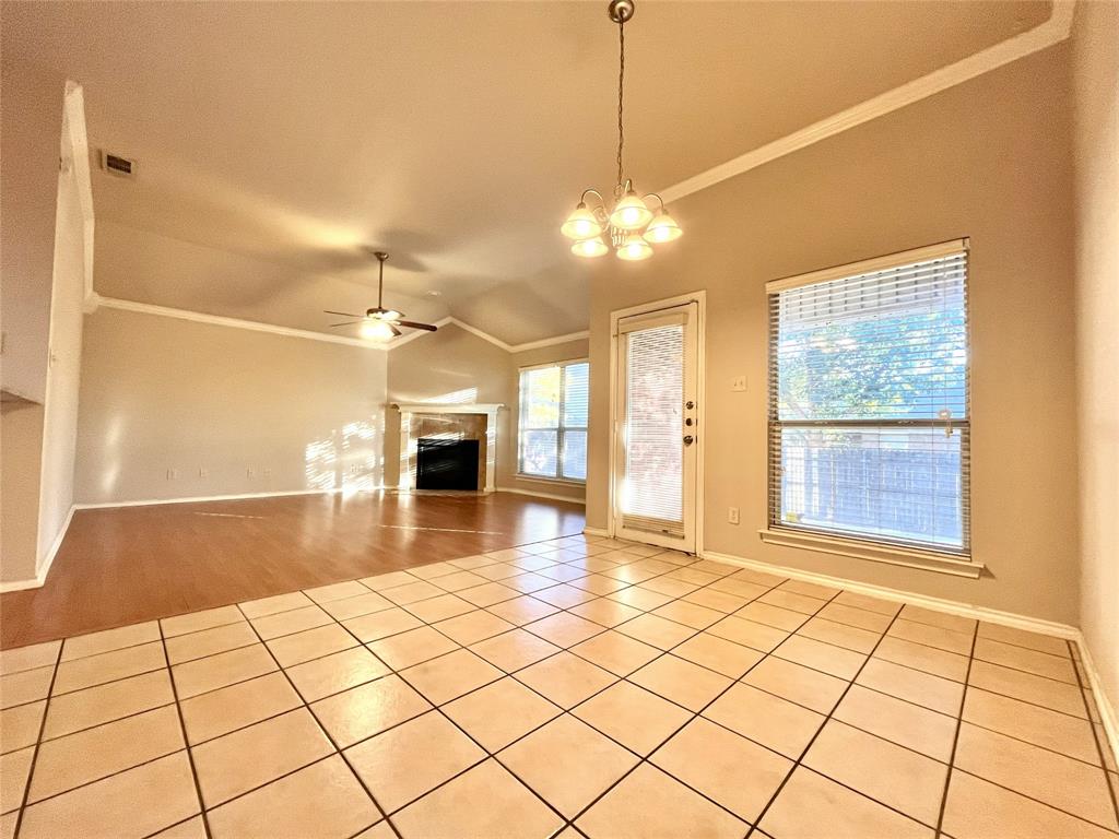 4808 Heber Springs Trail Fort Worth, TX 76244 - Photo 5 of 16 a view of a livingroom with a furniture wooden floor and window