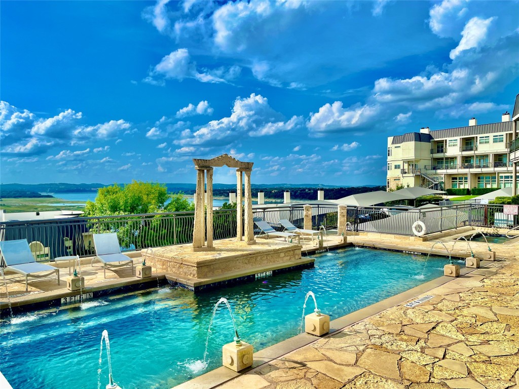 2918 Ranch Road 620, Unit 297 Austin, TX 78734 - Photo 30 of 37 Community pool featuring a patio