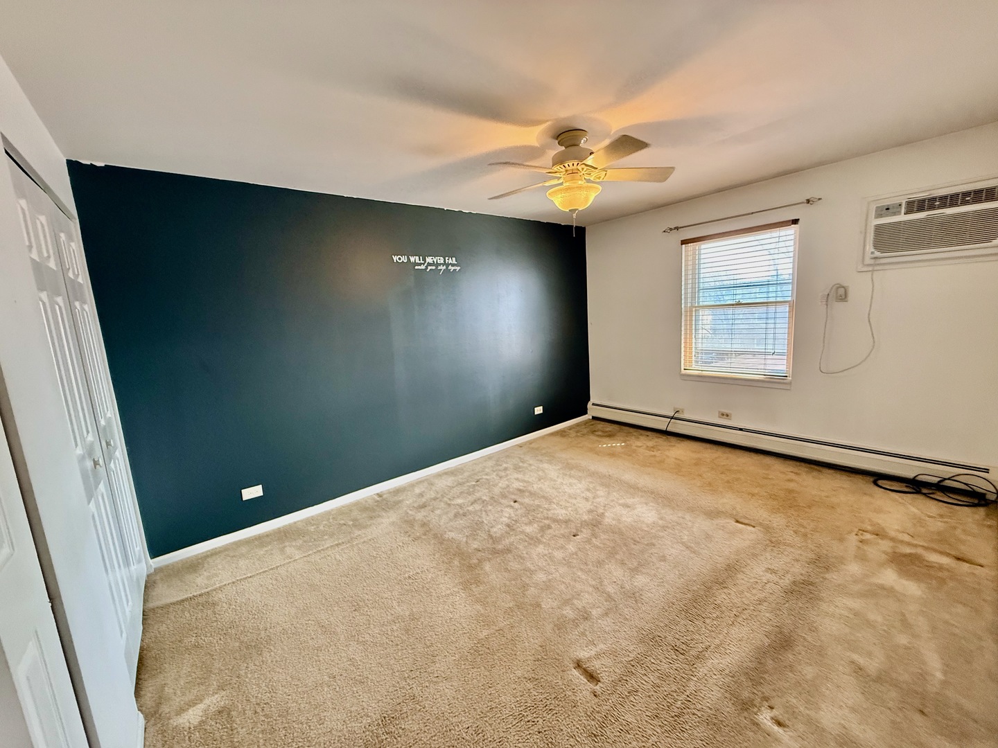 3823 West 123rd Street, Unit 302 Alsip, IL 60803 - Photo 16 of 40 en empty room with windows and chandelier