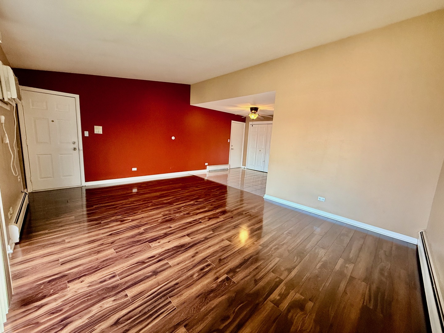 3823 West 123rd Street, Unit 302 Alsip, IL 60803 - Photo 9 of 40 a view of a room with wooden floor