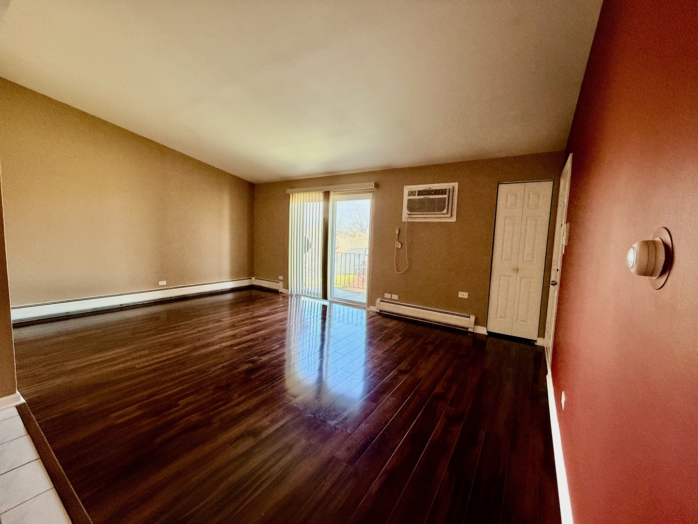 3823 West 123rd Street, Unit 302 Alsip, IL 60803 - Photo 10 of 40 a view of room with wooden floor