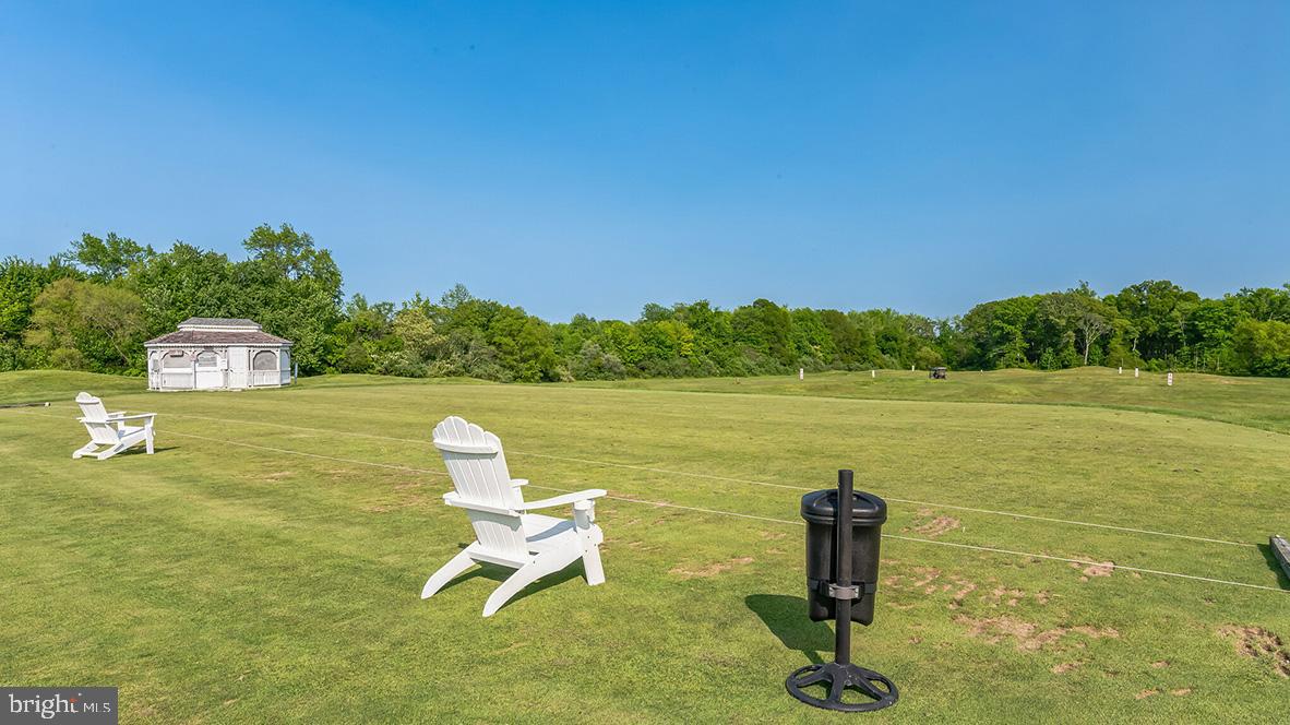 9 Dalton Way Rio Grande, NJ 08242 - Photo 45 of 51 a white house with a lake view
