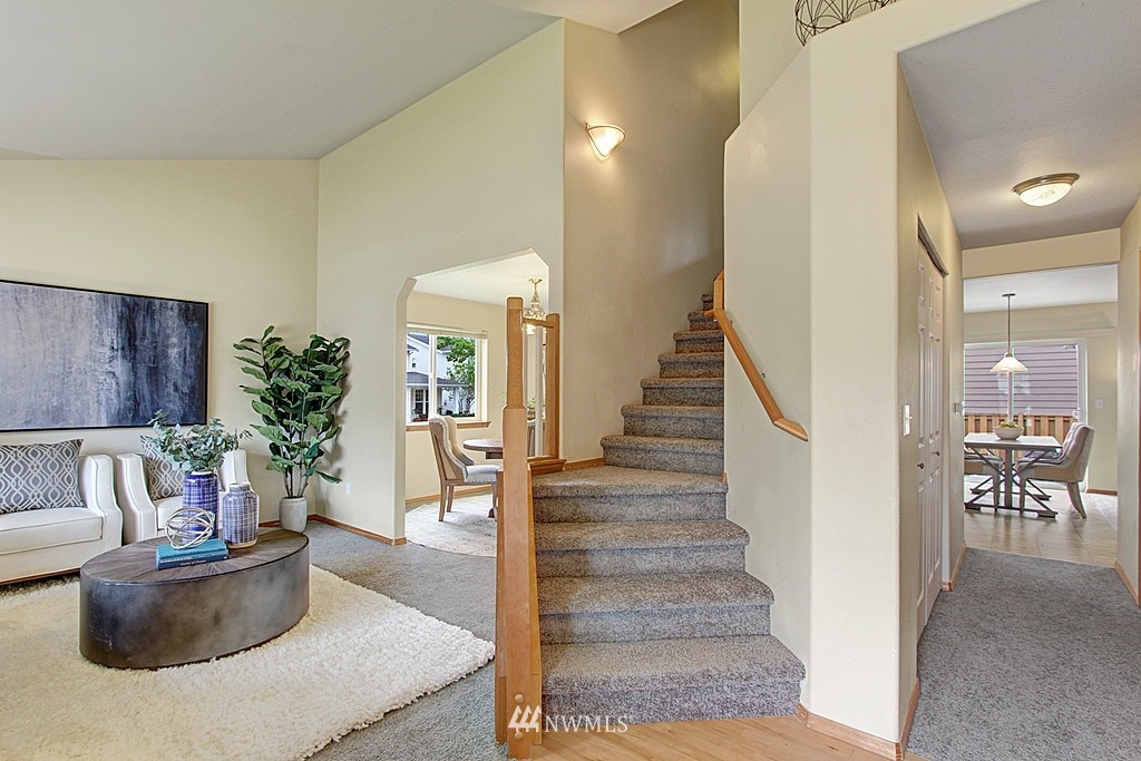 503 Ilwaco Avenue Northeast Renton, WA 98059 - Photo 17 of 17 a living room with furniture and a potted plant