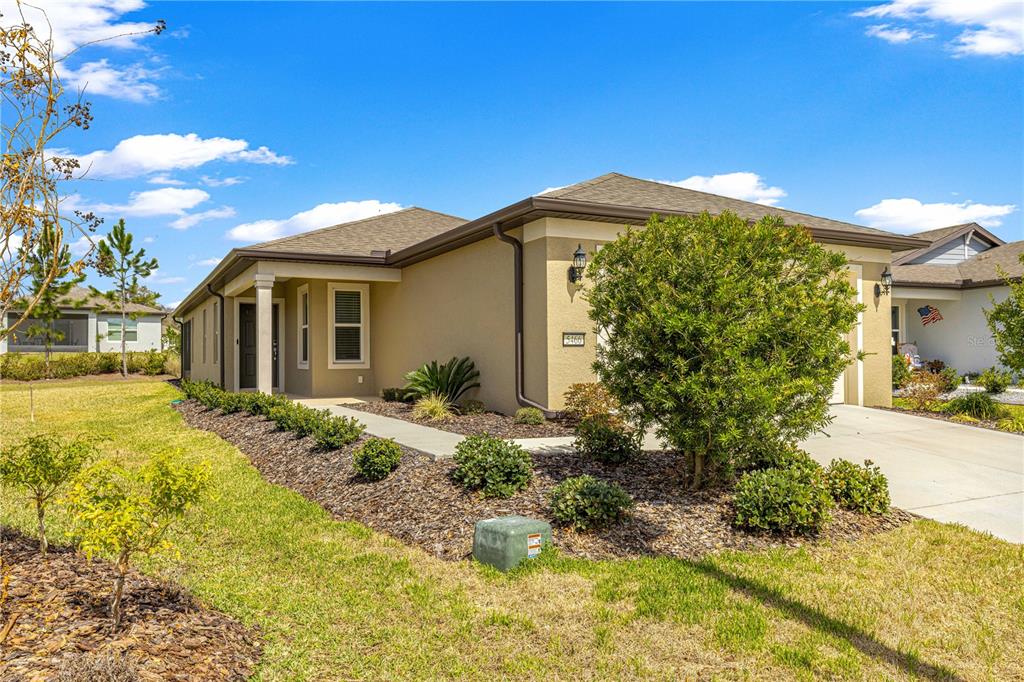 5466 Southwest 85th Ave Road Ocala, FL 34481 - Photo 2 of 36 a view of a house with a yard