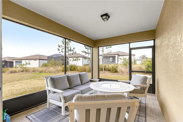 a living room with a couch and a table