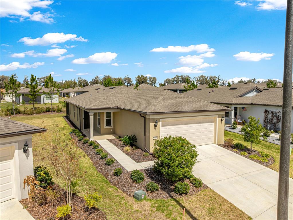 5466 Southwest 85th Ave Road Ocala, FL 34481 - Photo 32 of 36 a view of a house with a patio