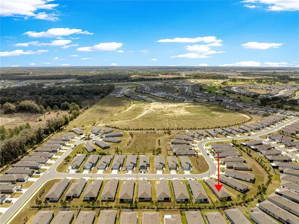 a view of city with ocean