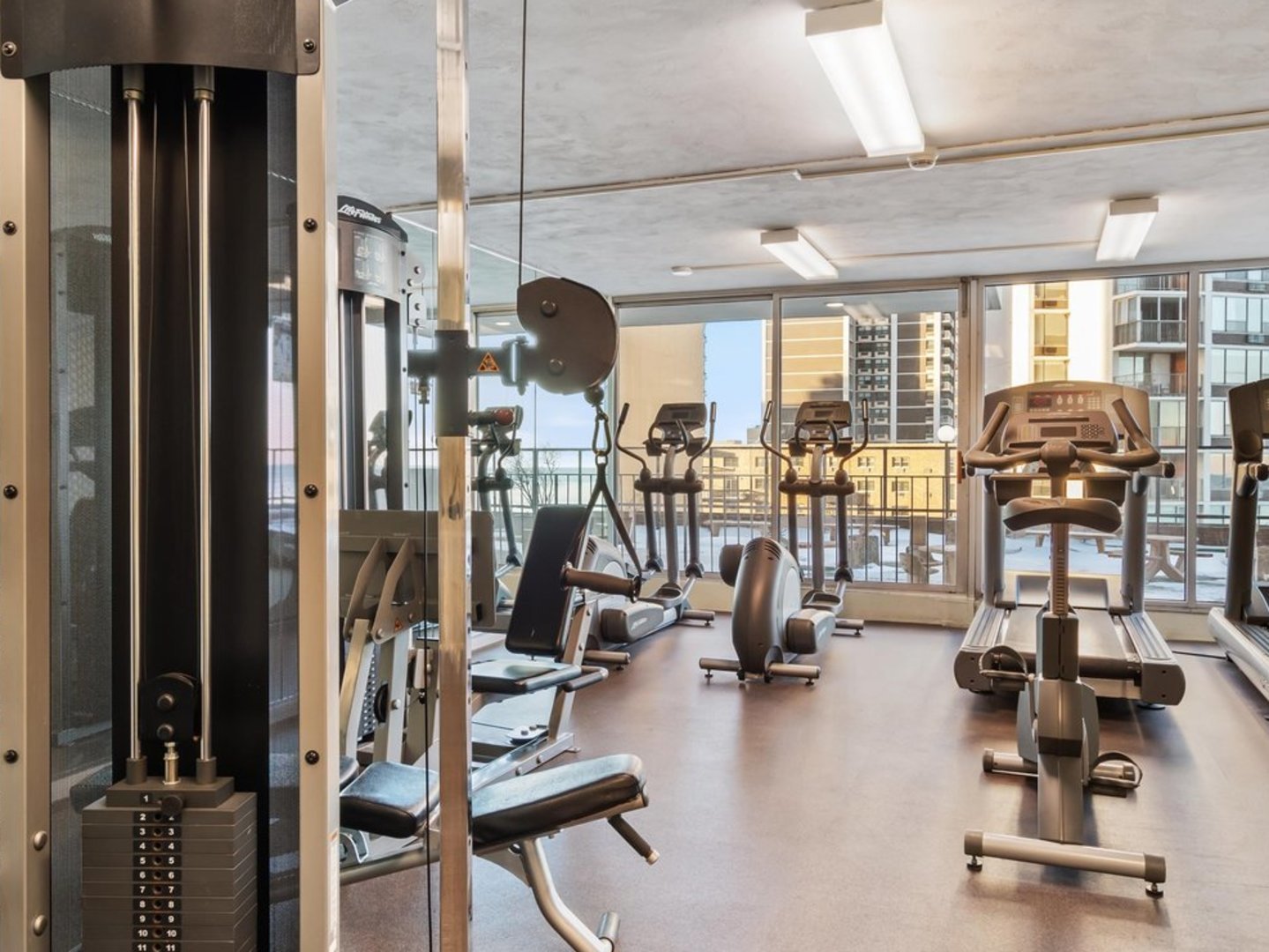 6033 North Sheridan Road, Unit 21D Chicago, IL 60660 - Photo 21 of 22 a view of a room with gym equipment