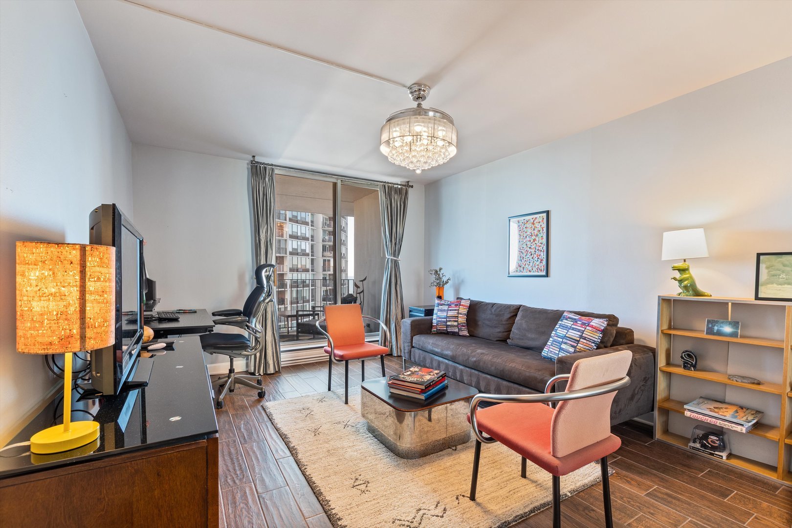 6033 North Sheridan Road, Unit 21D Chicago, IL 60660 - Photo 7 of 22 a living room with furniture and a large window