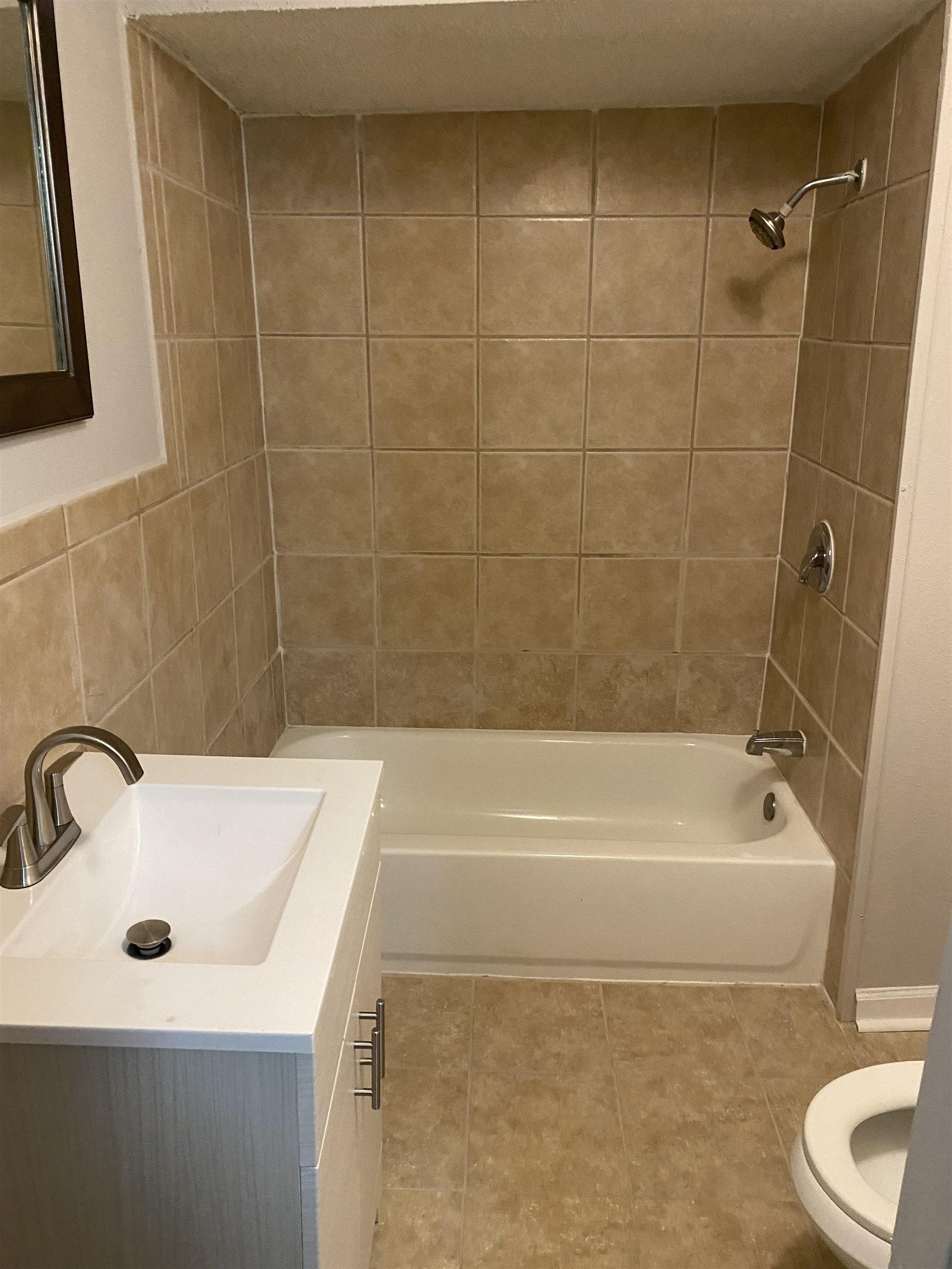 3219 Nathan Avenue Memphis, TN 38112 - Photo 12 of 23 a bathroom with a sink and a bathtub