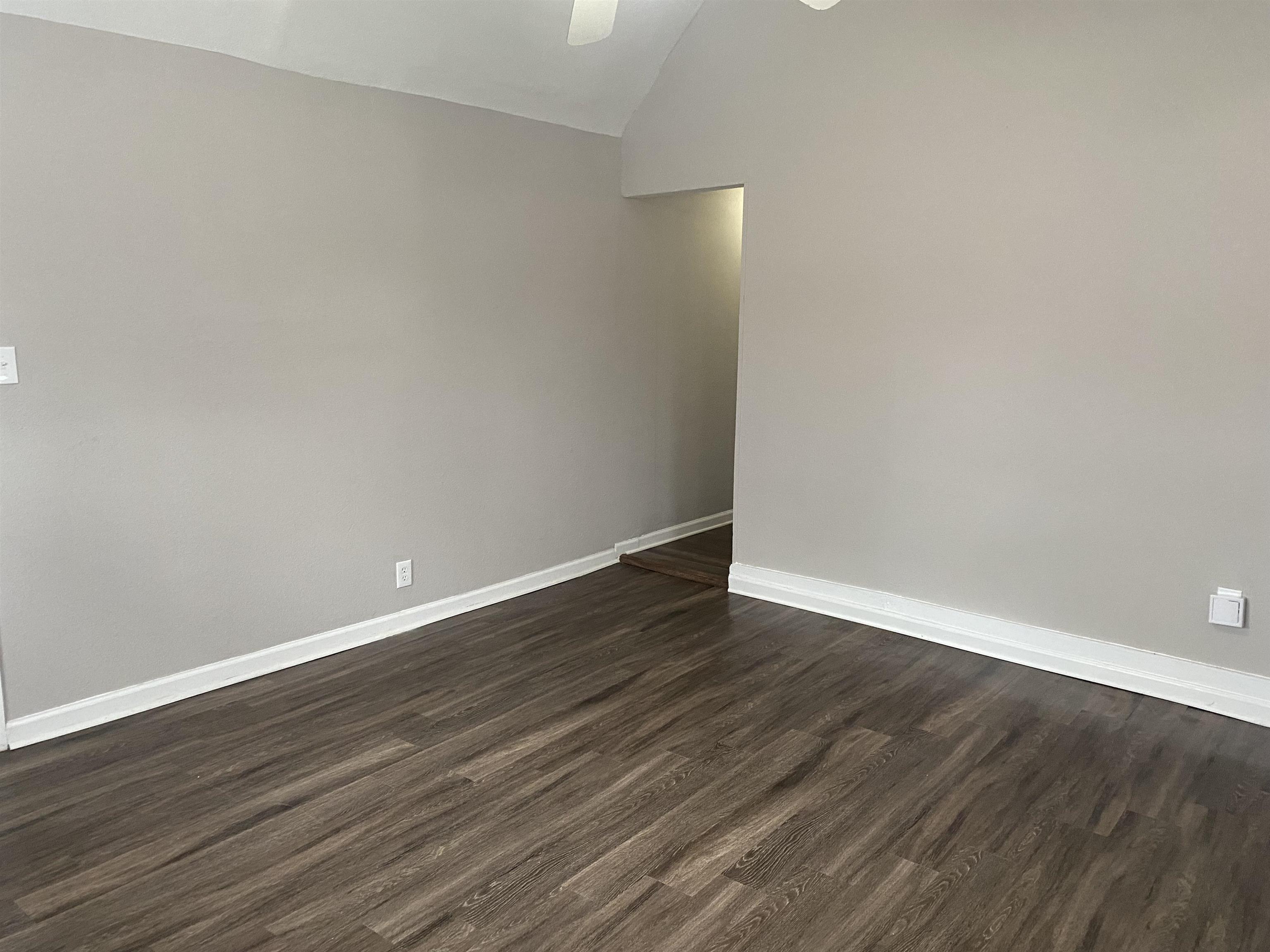 3219 Nathan Avenue Memphis, TN 38112 - Photo 2 of 23 a view of an empty room with wooden floor
