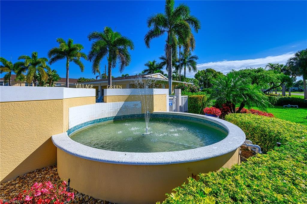 637 12th Avenue South, Unit 637 Naples, FL 34102 - Photo 20 of 35 a view of outdoor space yard and swimming pool