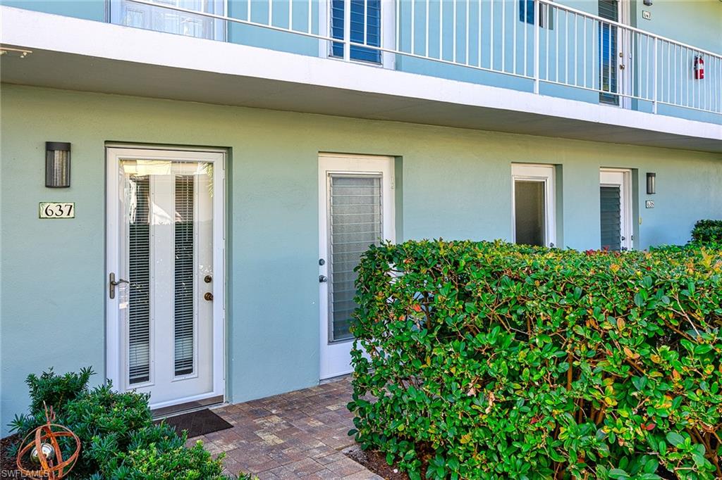 637 12th Avenue South, Unit 637 Naples, FL 34102 - Photo 4 of 35 a view of a house with plants and a plants