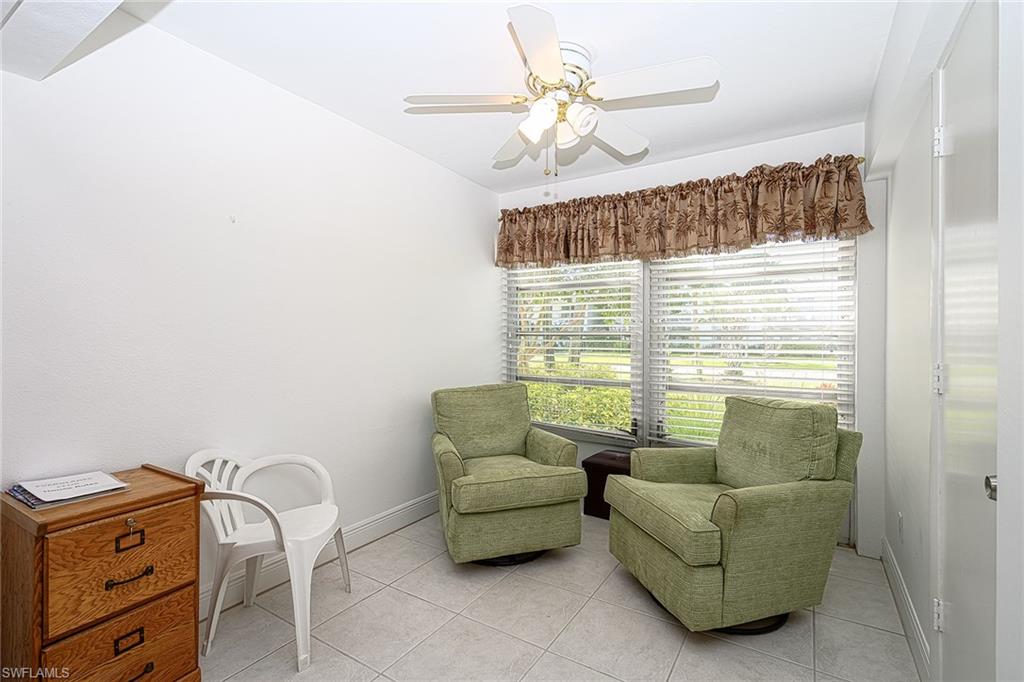 637 12th Avenue South, Unit 637 Naples, FL 34102 - Photo 10 of 35 a living room with furniture and a window