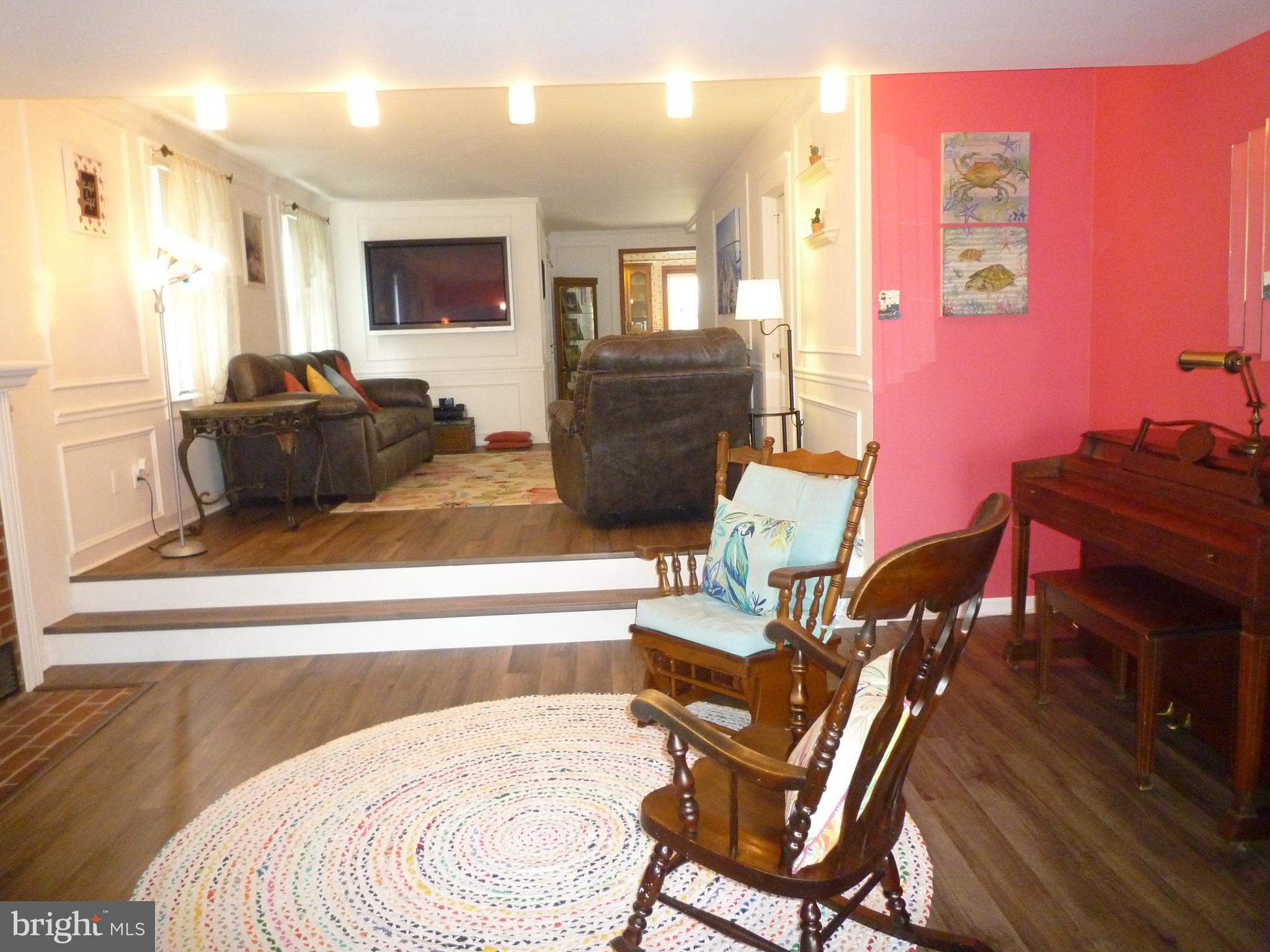 1315 Wildwood Beach Road Essex, MD 21221 - Photo 19 of 56 a living room with furniture and a flat screen tv