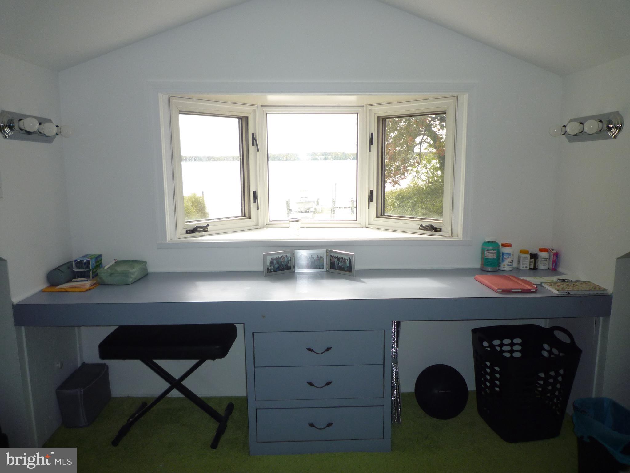 1315 Wildwood Beach Road Essex, MD 21221 - Photo 20 of 56 a kitchen with a table chair and window