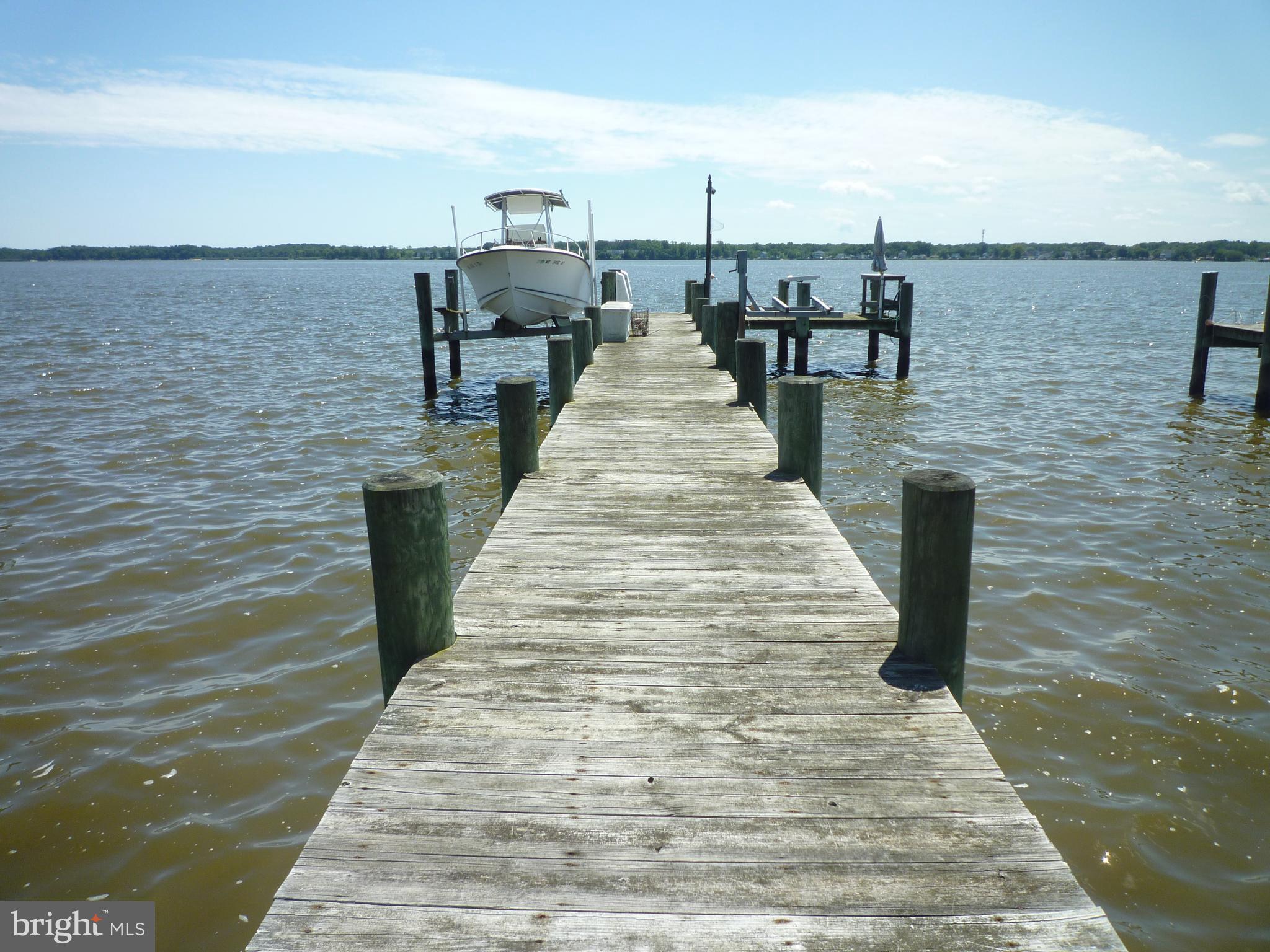 1315 Wildwood Beach Road Essex, MD 21221 - Photo 24 of 56 a park with pier next to a yard
