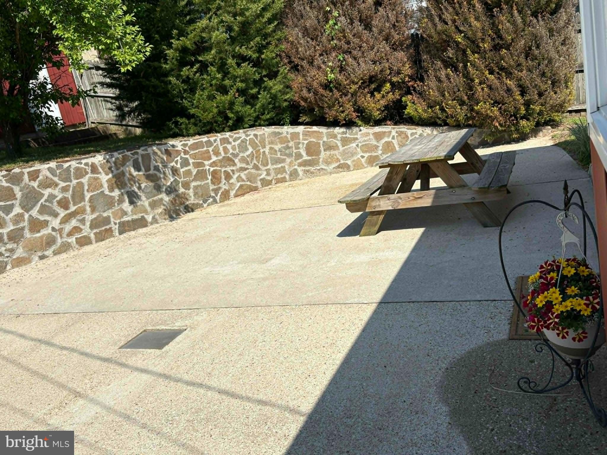 1315 Wildwood Beach Road Essex, MD 21221 - Photo 5 of 56 a view of a swimming pool with a patio and a fire pit