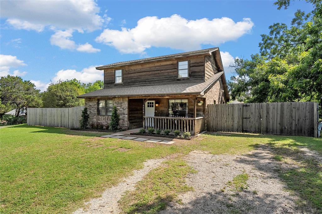 3000 North 15th A Street Waco, TX 76708 - Photo 2 of 24 a view of a house with backyard and sitting area
