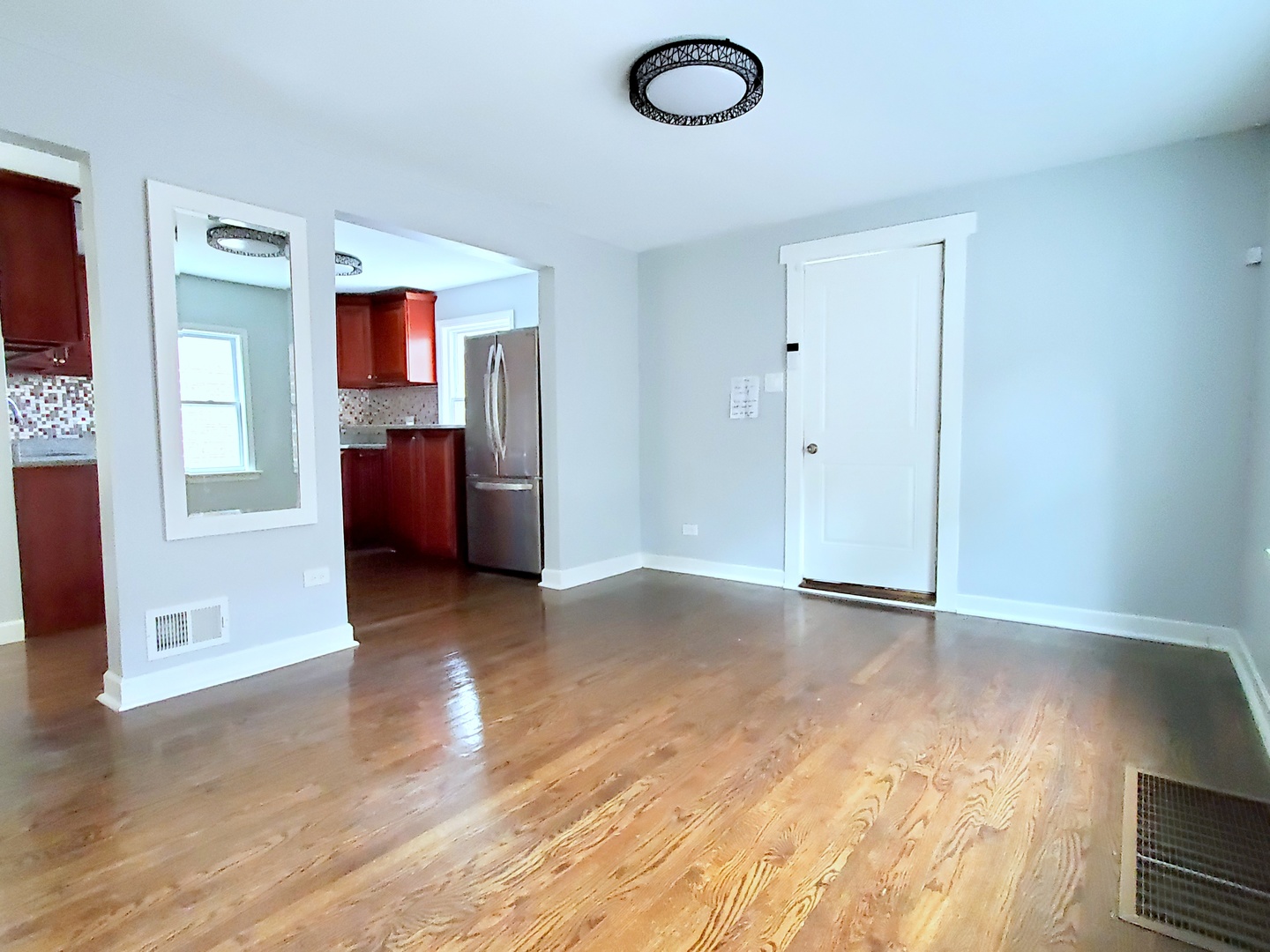 653 East 105th Street Chicago, IL 60628 - Photo 5 of 27 a view of a livingroom with a workspace