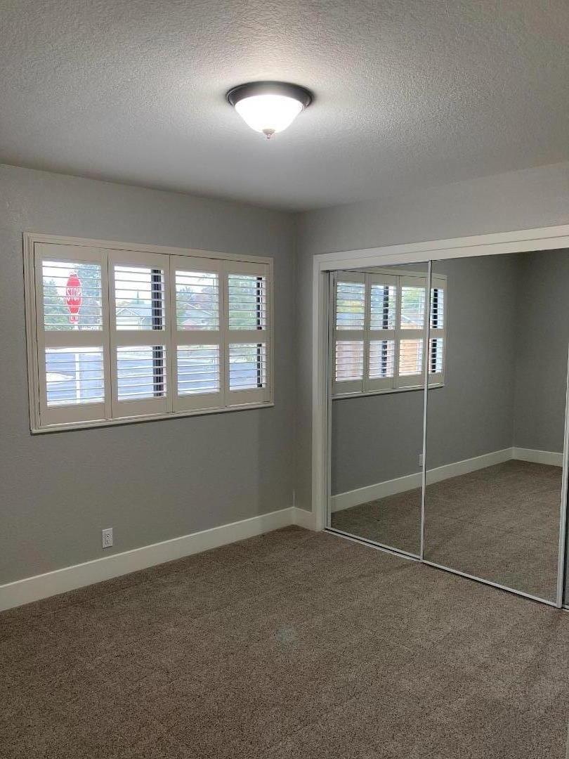 502 Oak Ridge Drive Roseville, CA 95661 - Photo 7 of 17 a view of an empty room with a window