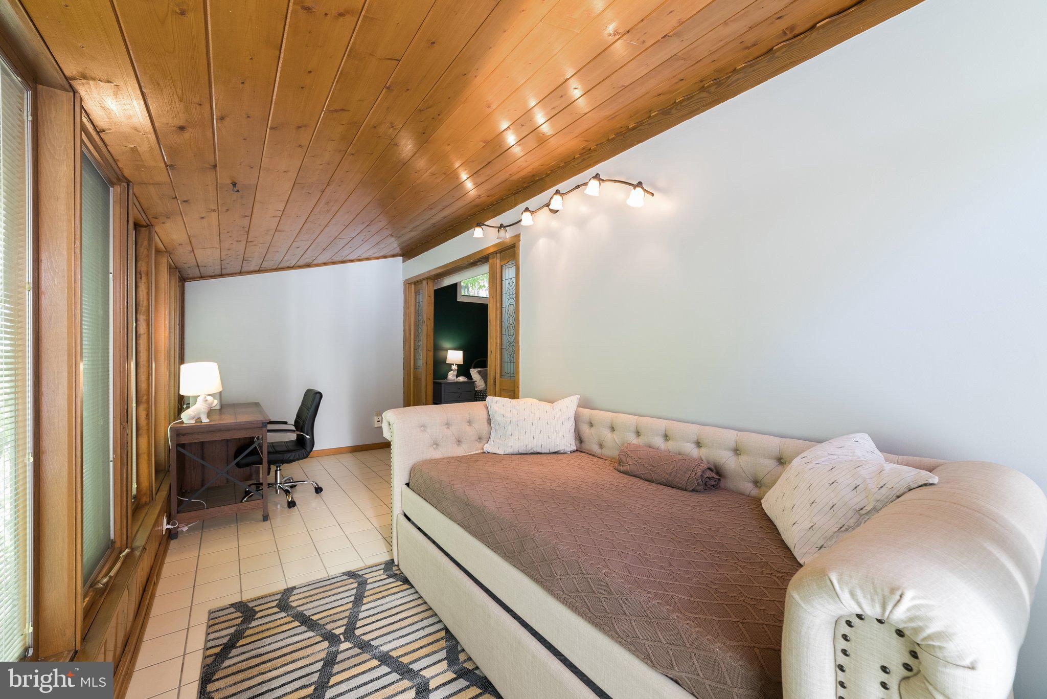 7545 Supinlick Ridge Road Mount Jackson, VA 22842 - Photo 26 of 48 Primary Bedroom Sunroom