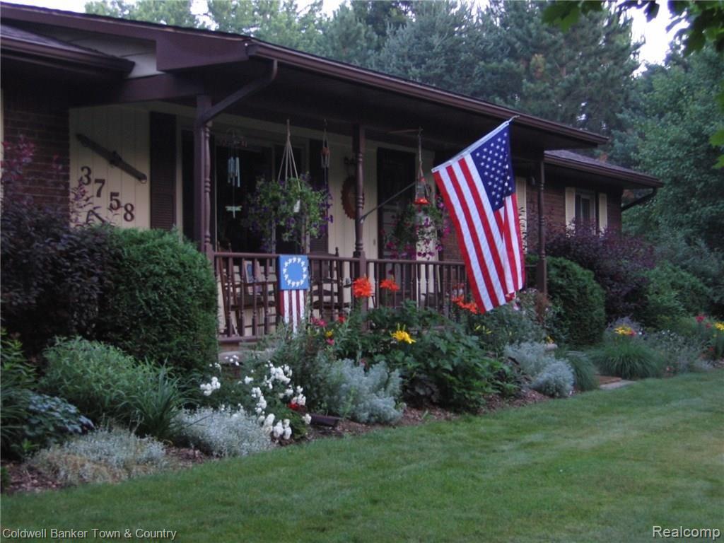 3758 Beattie Road Howell, MI 48843 - Photo 2 of 62 great porch for relaxing on