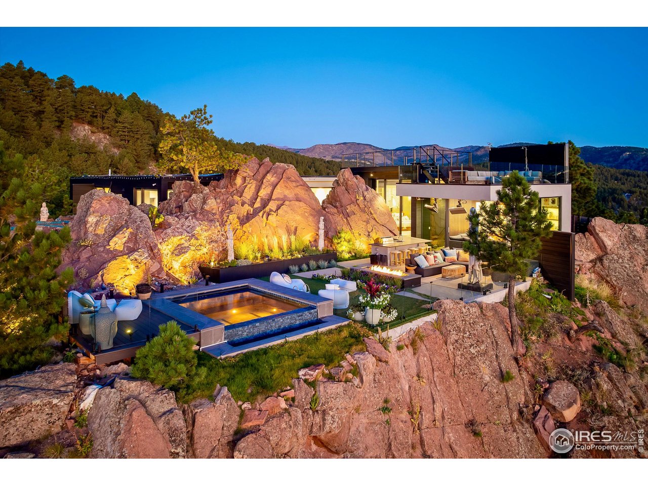 1151 Timber Lane Boulder, CO 80304 - Photo 2 of 33 Luxurious interiors, architectural significance, unmatched outdoor living spaces, and jaw-dropping 360 degree views come together in a one-of-a-kind retreat just six minutes from Broadway and 12 minutes from downtown Boulder.
