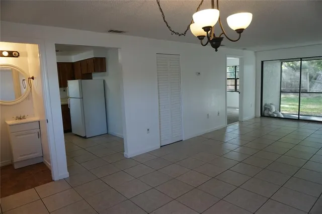 a view of a street with cars