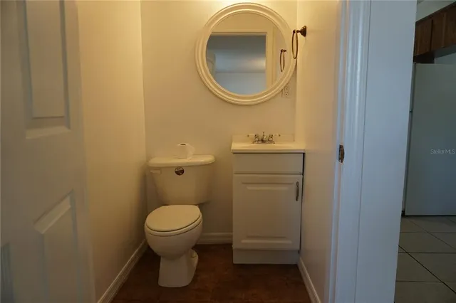 a bathroom with a toilet and a sink
