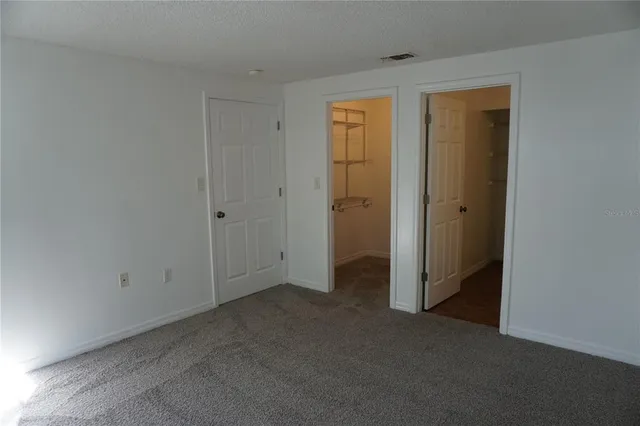 a view of a room with rack on the wall