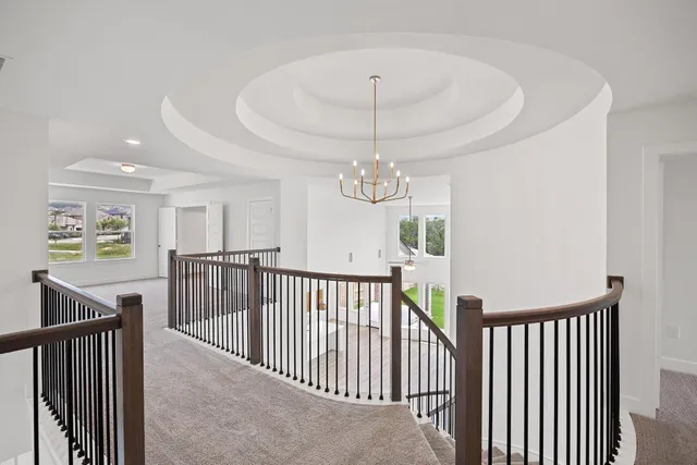 a bathroom with toilet sink and mirror