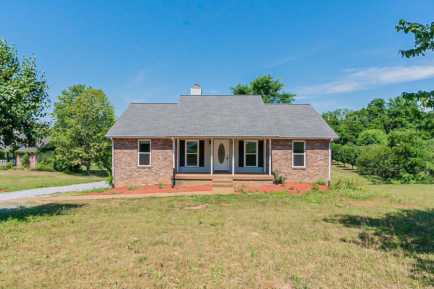 2222 Battle Creek Road Springfield, TN 37172 - Photo 1 of 17 front view of a house with a yard