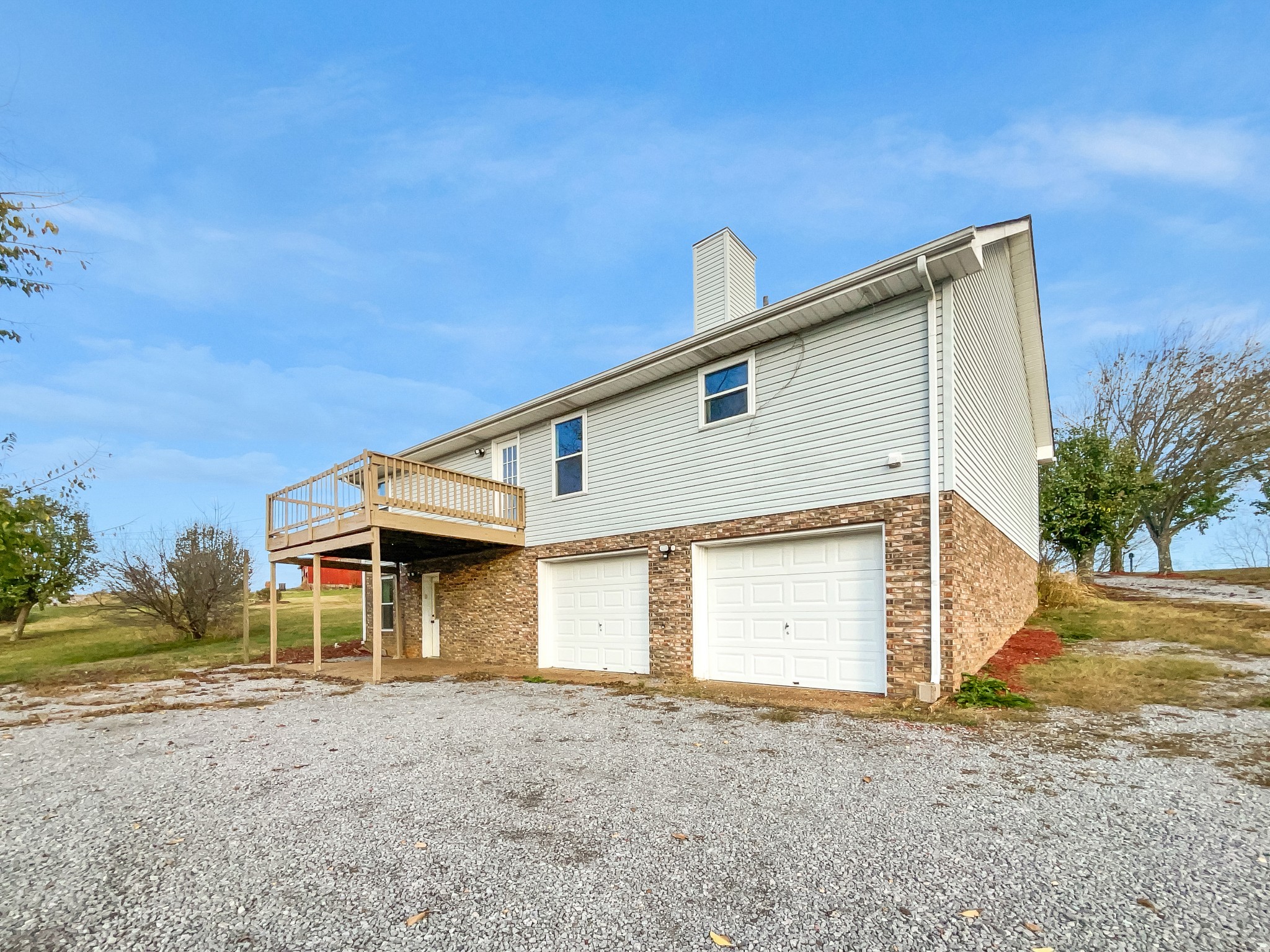 2222 Battle Creek Road Springfield, TN 37172 - Photo 17 of 17 a front view of a house with a yard and garage