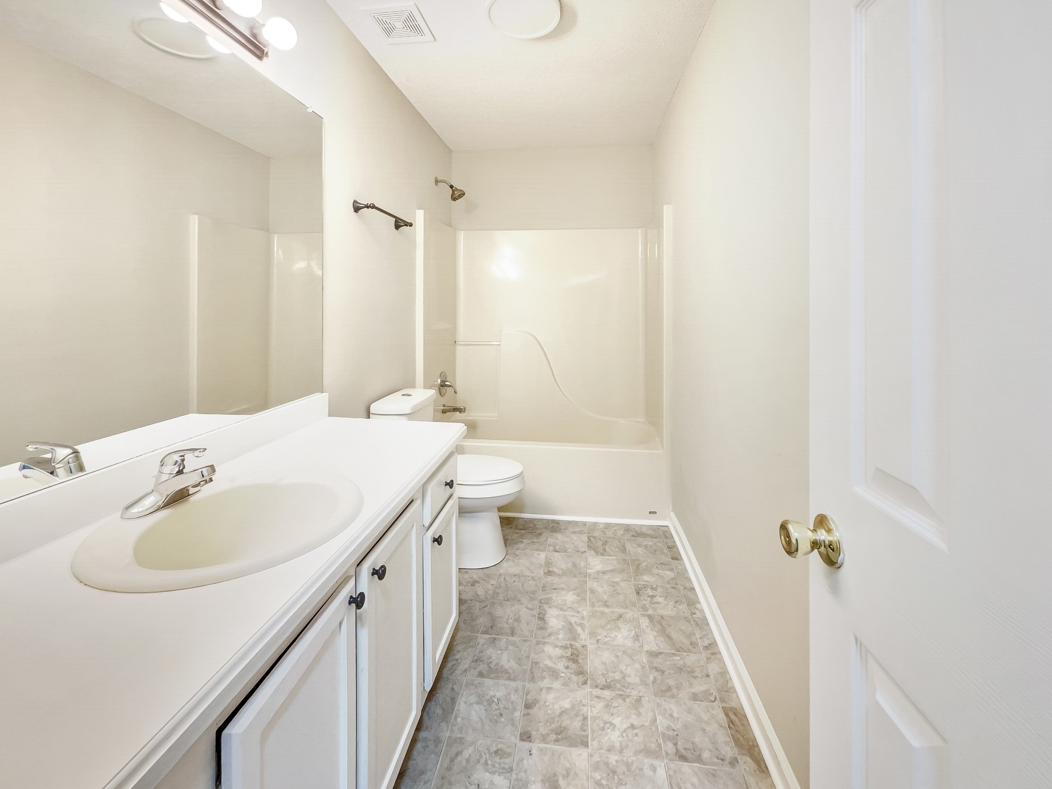 2222 Battle Creek Road Springfield, TN 37172 - Photo 9 of 17 a bathroom with a double vanity sink toilet and shower