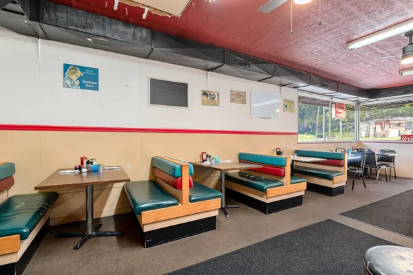 a living room with furniture and a table