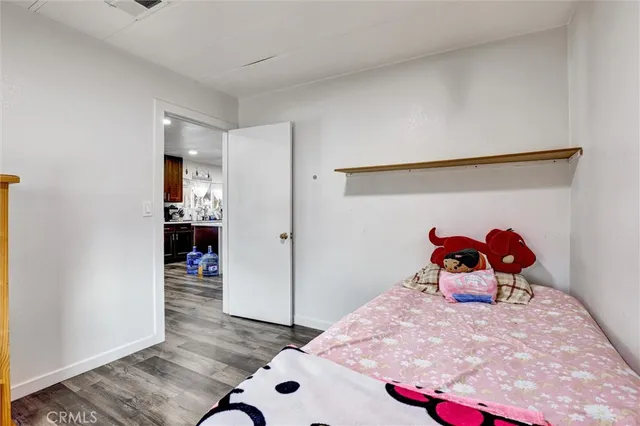 a bed room with a bed and a couch