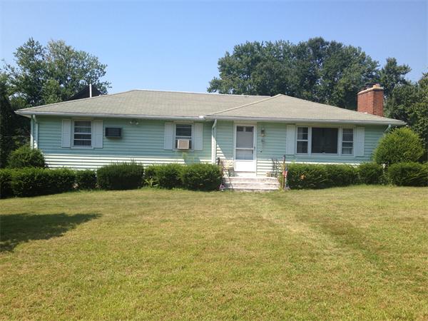 4 West Allen Ridge Road East Longmeadow, MA 01028 - Photo 1 of 9 a front view of a house with a yard and trees