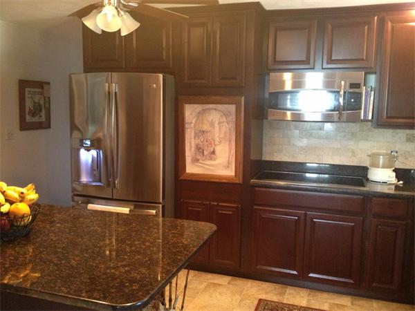 4 West Allen Ridge Road East Longmeadow, MA 01028 - Photo 5 of 9 a kitchen with granite countertop wooden cabinets and stainless steel appliances