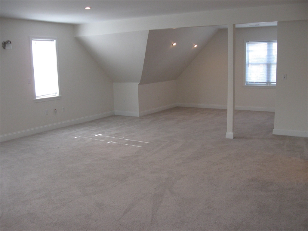 2856 Washington Street Boston, MA 02119 - Photo 20 of 39 an empty room with windows