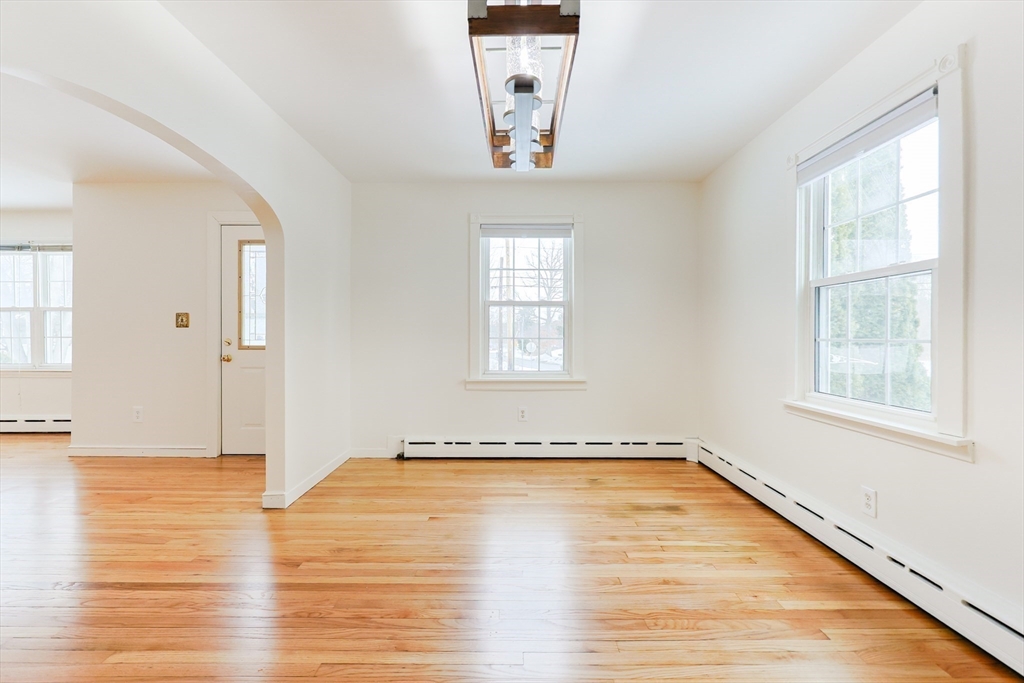 279 South Main Street Hopedale, MA 01747 - Photo 13 of 42 a view of a room with wooden floor and windows