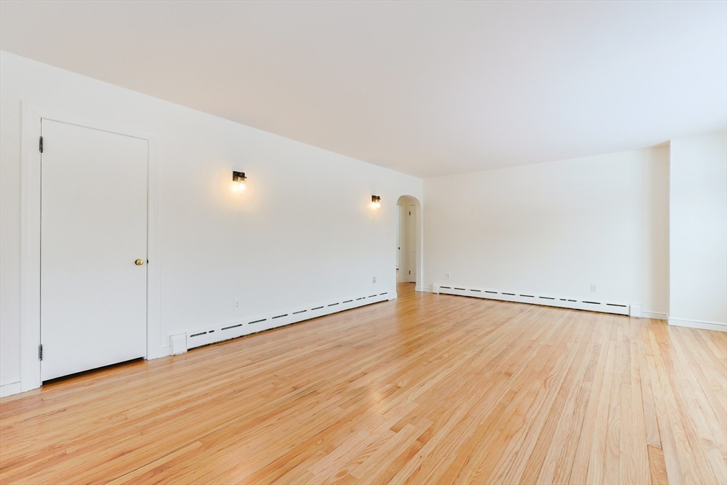279 South Main Street Hopedale, MA 01747 - Photo 20 of 42 a view of an empty room with wooden floor