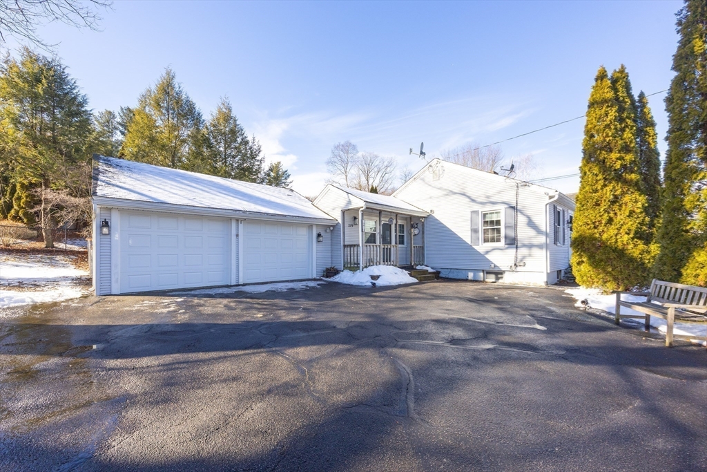 279 South Main Street Hopedale, MA 01747 - Photo 2 of 42 a view of a house with a yard and garage