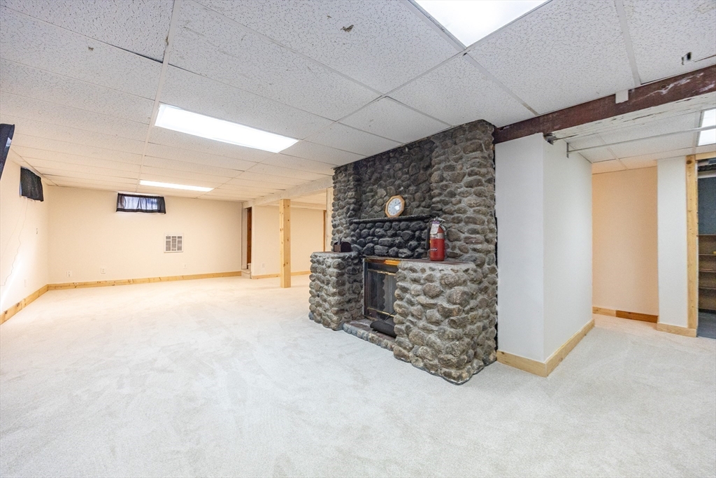 279 South Main Street Hopedale, MA 01747 - Photo 35 of 42 a room with storage and a white door