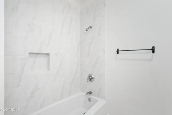 a bathroom with a bathtub