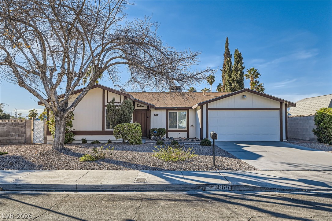 3665 Bronco Road Las Vegas, NV 89103 - Photo 1 of 28 A well-maintained facade with an attached garage offers inviting curb appeal.